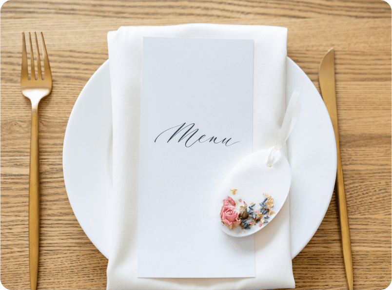 Elegant table setting with menu card.
